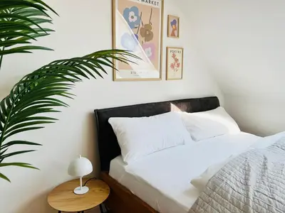 Ein Bett oder Betten in einem Zimmer der Unterkunft Cozy apartment for 2 near Mering train station