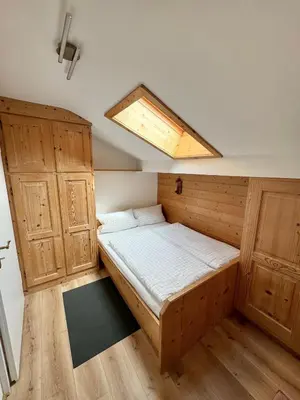 Ein Bett oder Betten in einem Zimmer der Unterkunft Ferienwohnung Grasegger
