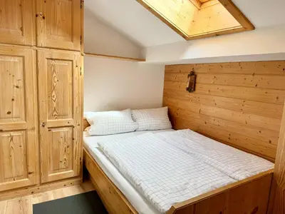 Ein Bett oder Betten in einem Zimmer der Unterkunft Ferienwohnung Grasegger
