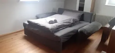 Ein Sitzbereich in der Unterkunft 3-Zimmer Ferienwohnung für 6-8 Personen nahe München, Fürstenfeldbruck, Augsburg, Landsberg, Ammersee