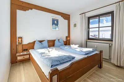 Ein Bett oder Betten in einem Zimmer der Unterkunft Ferienwohnung Kathi