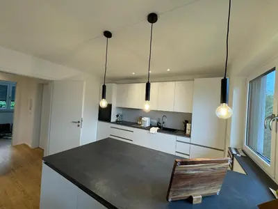 Ein Bett oder Betten in einem Zimmer der Unterkunft Liboria I Stylische Maisonette Wohnung Alpenblick I 4min zum See