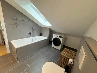 Ein Badezimmer in der Unterkunft Liboria I Stylische Maisonette Wohnung Alpenblick I 4min zum See