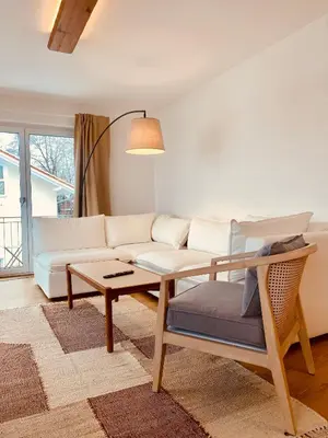 Ein Sitzbereich in der Unterkunft Liboria I Stylische Maisonette Wohnung Alpenblick I 4min zum See