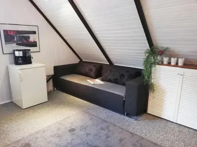 Ein Sitzbereich in der Unterkunft Modern eingerichtetes Zimmer