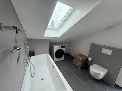 Ein Badezimmer in der Unterkunft ღLIBORIA I Als Gruppe in Uffing I 4 min zum See I Sauna