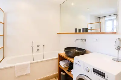 Ein Badezimmer in der Unterkunft Alpenkönig I