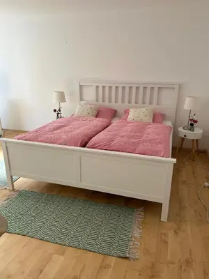 Ein Bett oder Betten in einem Zimmer der Unterkunft Wohnung mit Terrasse am Waldrand
