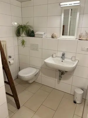 Ein Badezimmer in der Unterkunft Wohnung mit Terrasse am Waldrand