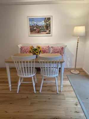 Ein Sitzbereich in der Unterkunft Wohnung mit Terrasse am Waldrand