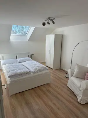 Ein Bett oder Betten in einem Zimmer der Unterkunft Ferienwohnung Martin 2 Schlafzimmer