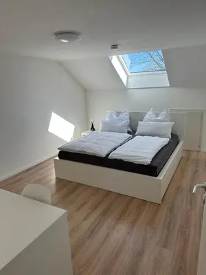 Ein Bett oder Betten in einem Zimmer der Unterkunft Ferienwohnung Martin 2 Schlafzimmer
