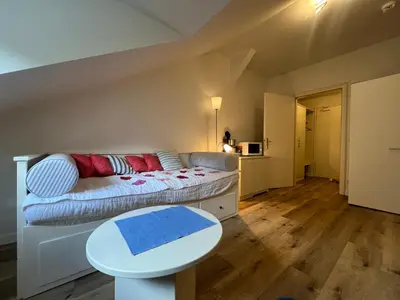 Ein Bett oder Betten in einem Zimmer der Unterkunft ciao-aschau Haus zur Burg Apartment 305 Geres