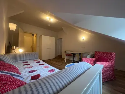 Ein Bett oder Betten in einem Zimmer der Unterkunft ciao-aschau Haus zur Burg Apartment 305 Geres