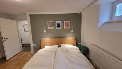 Ein Bett oder Betten in einem Zimmer der Unterkunft Ruffinis Souterrain
