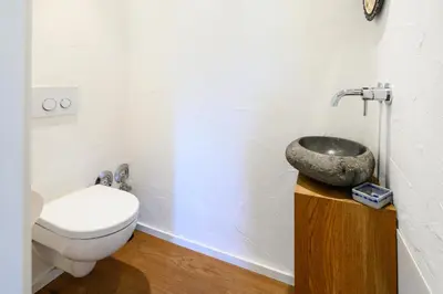 Ein Badezimmer in der Unterkunft Alpenkönig II