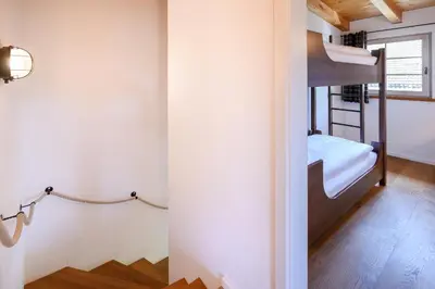 Ein Bett oder Betten in einem Zimmer der Unterkunft Alpenkönig II