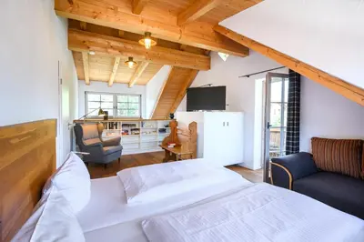 Ein Bett oder Betten in einem Zimmer der Unterkunft Alpenkönig II