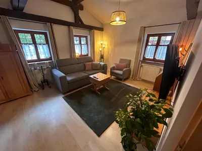 Ein Sitzbereich in der Unterkunft Ferienwohnung Stüberl inklusive Königscard
