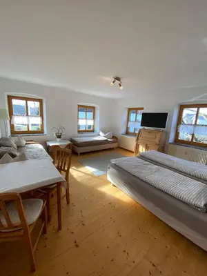 Ein Bett oder Betten in einem Zimmer der Unterkunft Gasthof Oberer Wirt Biburg