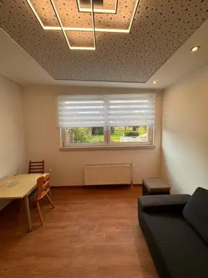 Ein Sitzbereich in der Unterkunft Gemütliche Auszeit in Rennertshofen