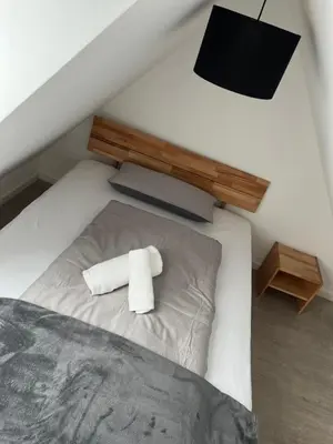 Ein Bett oder Betten in einem Zimmer der Unterkunft MaiLiving