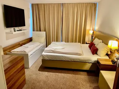 Ein Bett oder Betten in einem Zimmer der Unterkunft Mars Apart