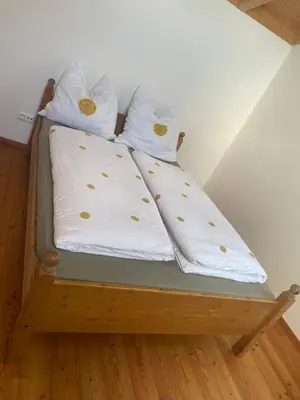Ein Bett oder Betten in einem Zimmer der Unterkunft Gemütlichkeit - Land