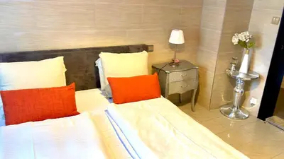Ein Bett oder Betten in einem Zimmer der Unterkunft Schiller-14