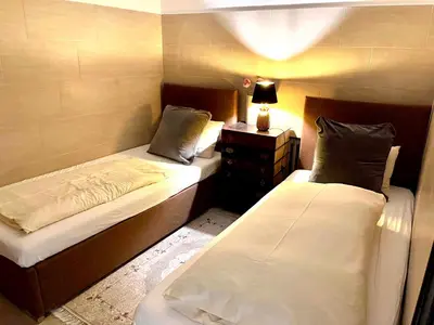 Ein Bett oder Betten in einem Zimmer der Unterkunft Schiller-14