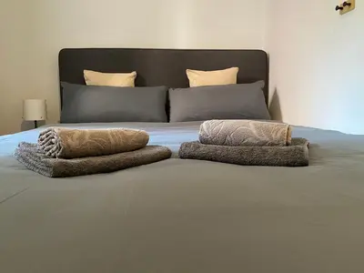 Ein Bett oder Betten in einem Zimmer der Unterkunft SYMBIOSE-Ferienwohnung