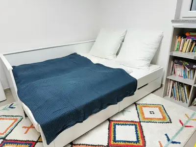 Ein Bett oder Betten in einem Zimmer der Unterkunft EMMA Gardencity Basement Flat