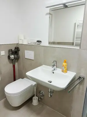 Ein Badezimmer in der Unterkunft EMMA Gardencity Basement Flat