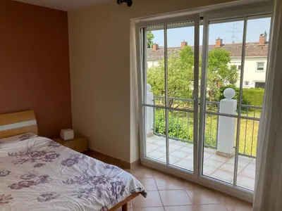 Ein Bett oder Betten in einem Zimmer der Unterkunft Riccardoshome