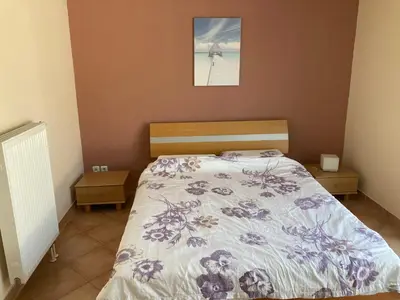Ein Bett oder Betten in einem Zimmer der Unterkunft Riccardoshome