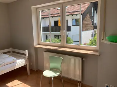 Ein Bett oder Betten in einem Zimmer der Unterkunft Riccardoshome