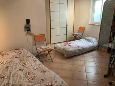 Ein Bett oder Betten in einem Zimmer der Unterkunft Riccardoshome