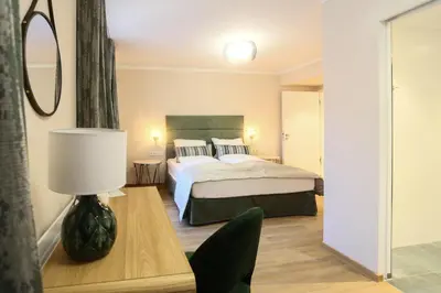 Ein Bett oder Betten in einem Zimmer der Unterkunft Hotel Lutz