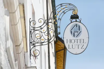 Ein Zertifikat, Auszeichnung, Logo oder anderes Dokument, das in der Unterkunft Hotel Lutz ausgestellt ist
