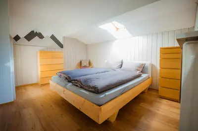 Ein Bett oder Betten in einem Zimmer der Unterkunft Relax Appartment Walchensee