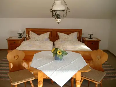 Ein Bett oder Betten in einem Zimmer der Unterkunft Ferienwohnungen 