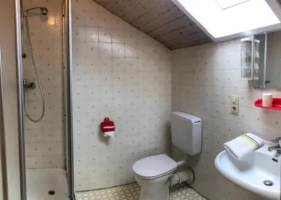 Ein Badezimmer in der Unterkunft Ferienwohnungen 