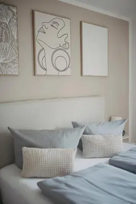 Ein Bett oder Betten in einem Zimmer der Unterkunft Ferienwohnung am Bichl - Stilvoll mit Terrasse, Carport und Gästekarte