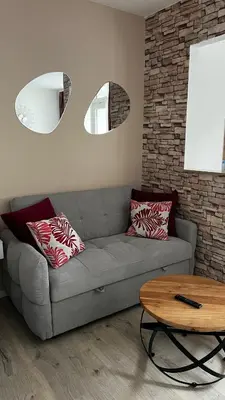 Ein Sitzbereich in der Unterkunft Apartment AS mit Balkon