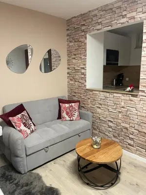 Ein Sitzbereich in der Unterkunft Apartment AS mit Balkon