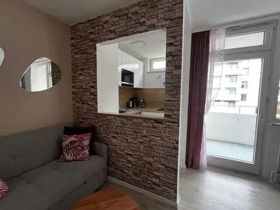 Ein Sitzbereich in der Unterkunft Apartment AS mit Balkon