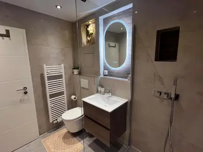 Ein Badezimmer in der Unterkunft Apartment AS mit Balkon