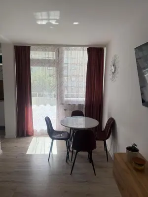 Ein Sitzbereich in der Unterkunft Apartment AS mit Balkon
