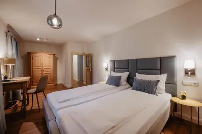 Ein Bett oder Betten in einem Zimmer der Unterkunft Ferienwohnung Reslbauer