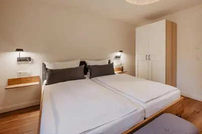 Ein Bett oder Betten in einem Zimmer der Unterkunft Ferienwohnung Reslbauer